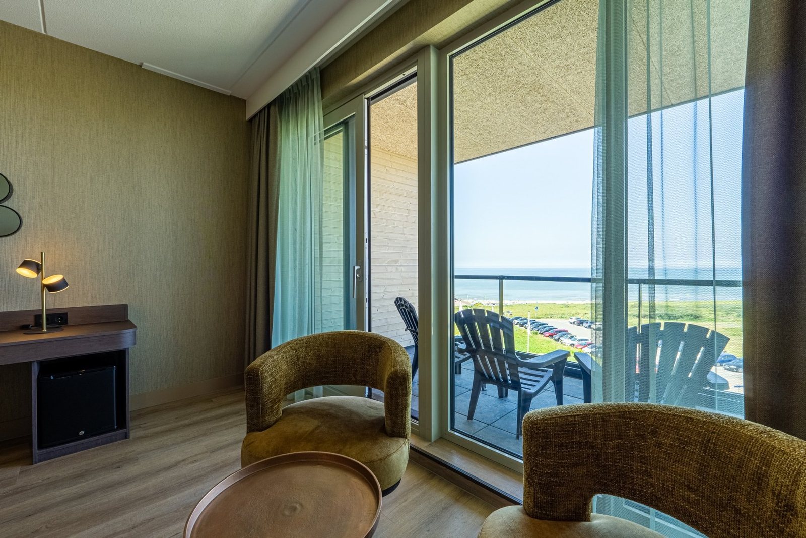 Hotelkamer met balkon aan zee